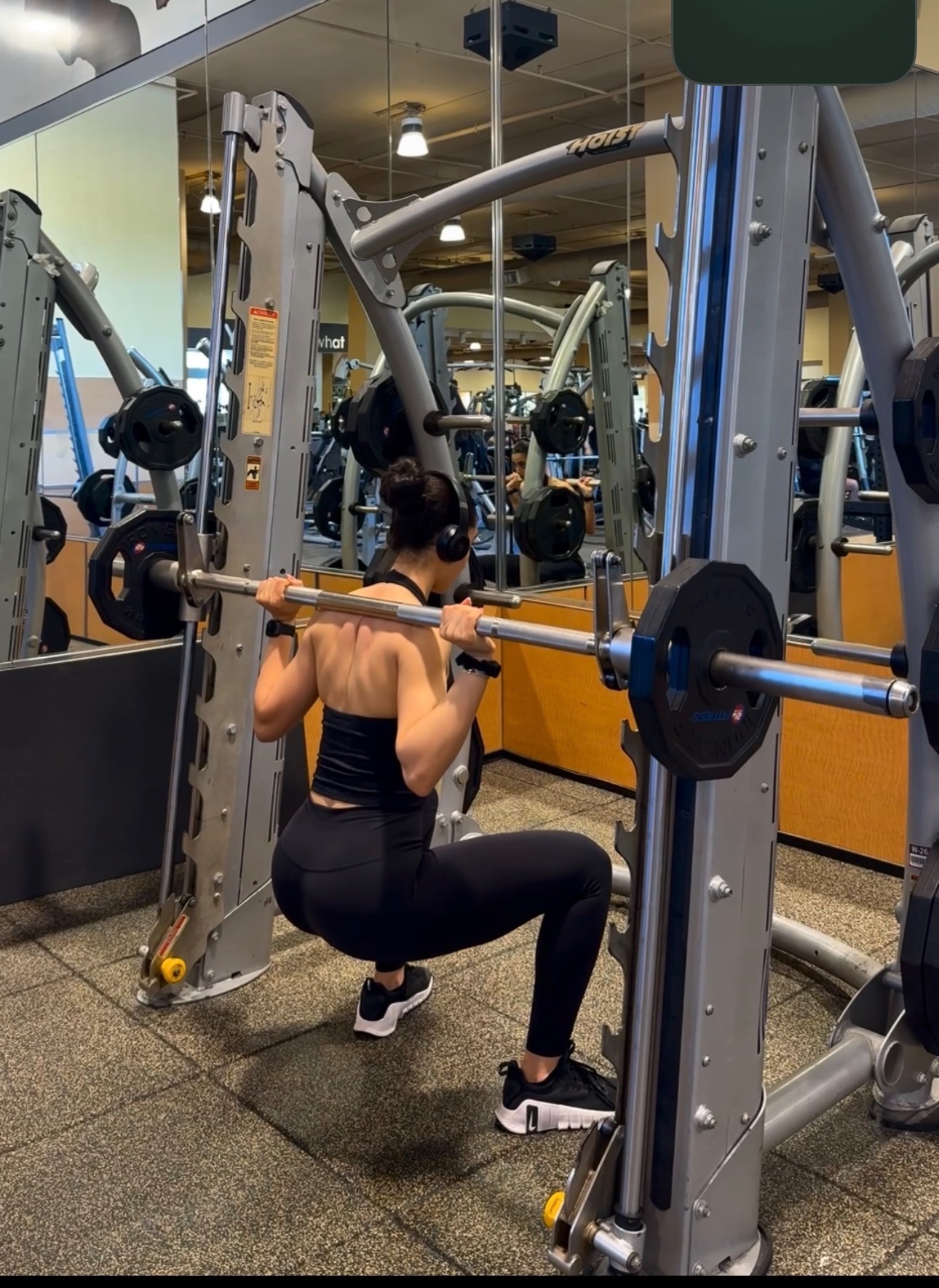 Julia squatting on Smith machine
