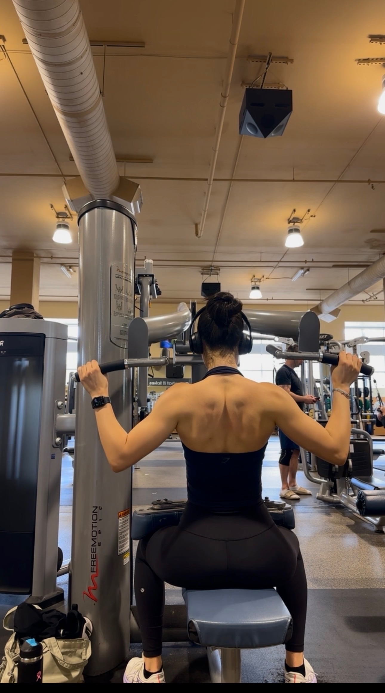 Julia on lat pulldown machine